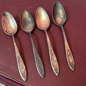 Set of 4 “Community Plate” spoons. Vintage